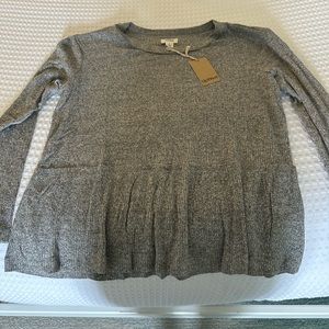 UpWest peplum top. New with tags. Size L